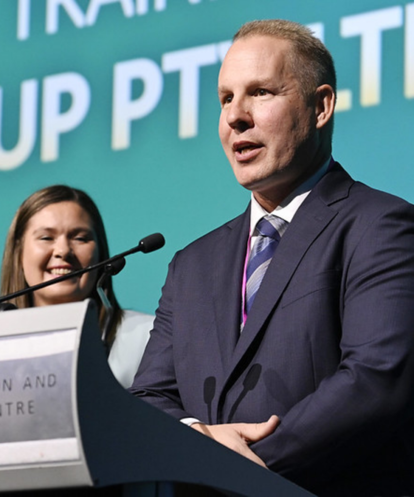 Simon at the WA Training Awards receiving the WA large trainer of the year award in 2025